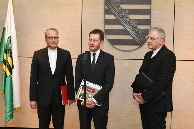 Ministerpräsident Micheal Kretschmer, Carsten Rentzing, Heinrich Timmerevers